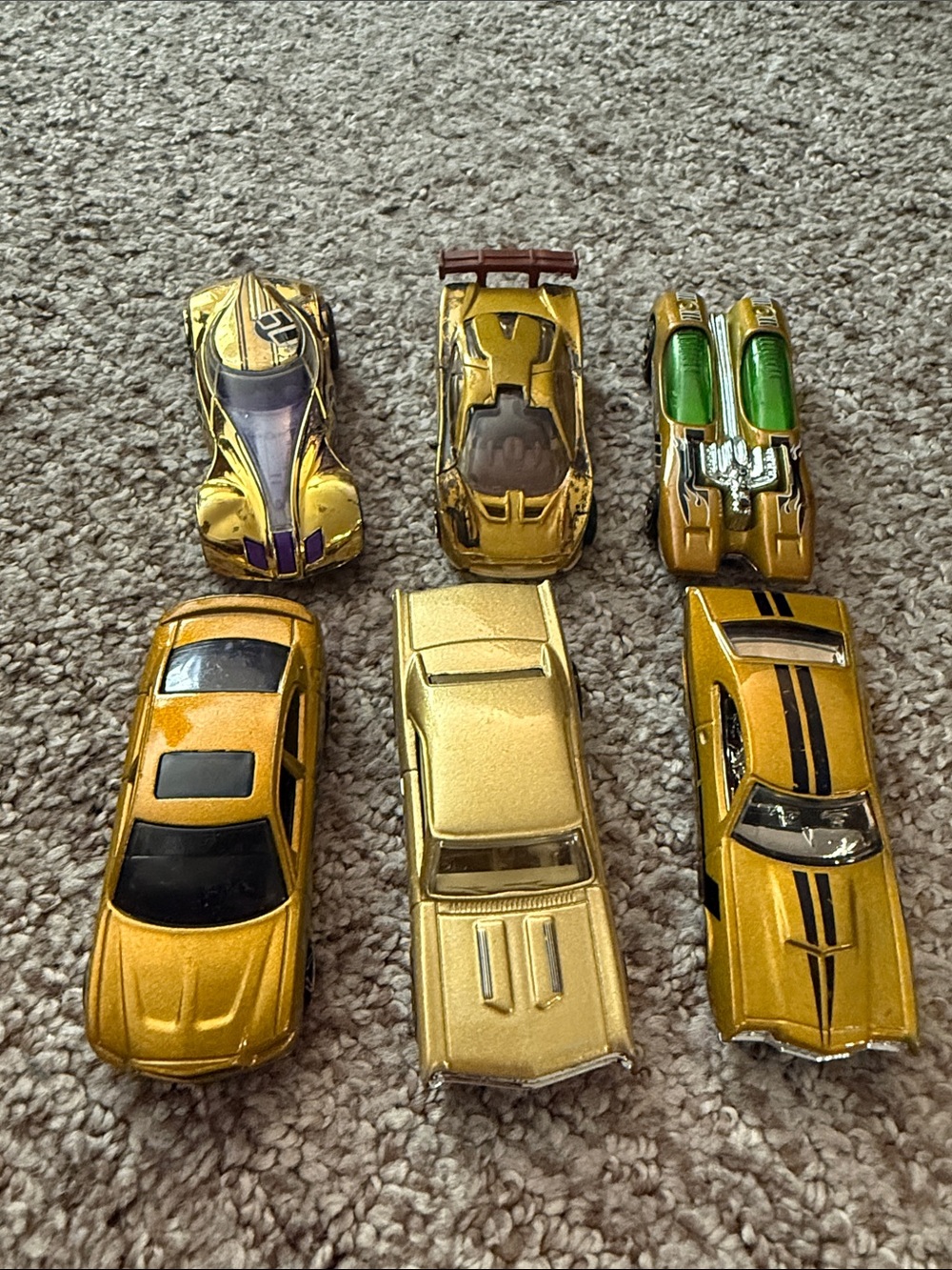 Hot Topic Gold Toy Car Lot with Green Accents